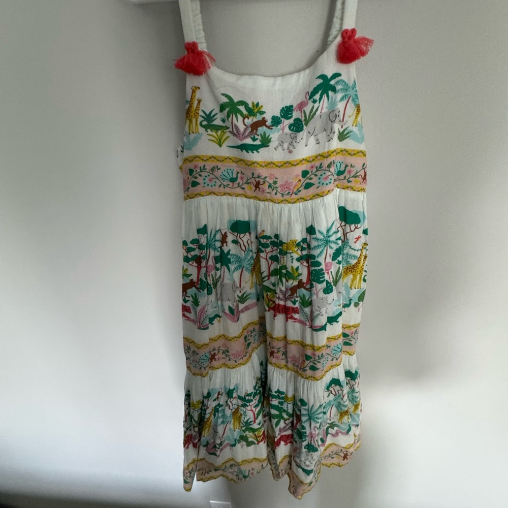 Boden White Tropical Kids Dress with orange tassels.